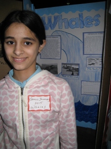 A member of UNC proudly displaying her NF Winter Exhibition project from 6th grade :)